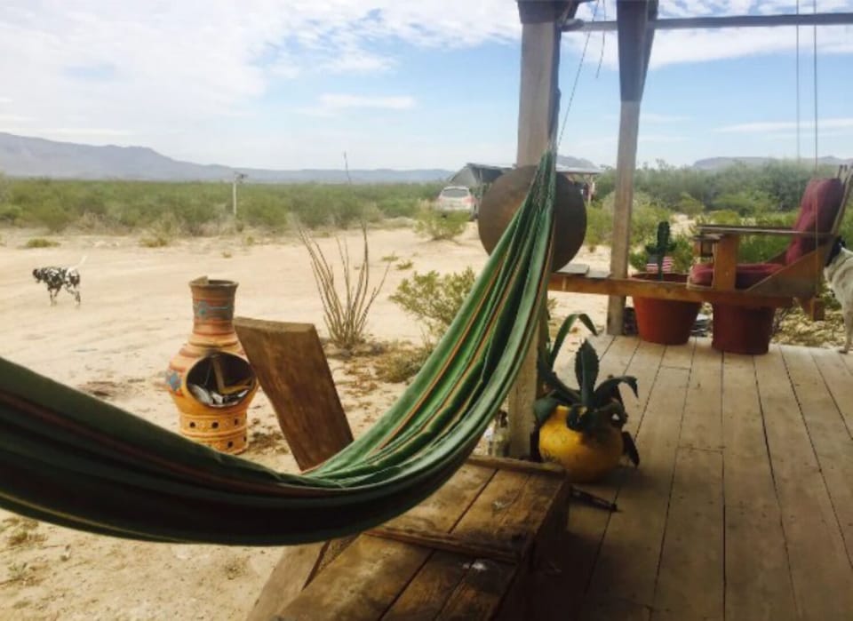 Front porch hammock hangout for your afternoon nap or simply relaxation.