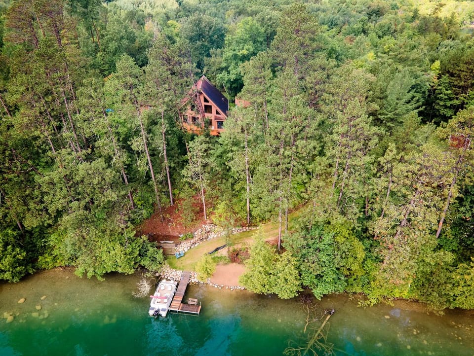 Deer Lake Chalet overlooking Deer Lake. The boat landing is on the same bay.