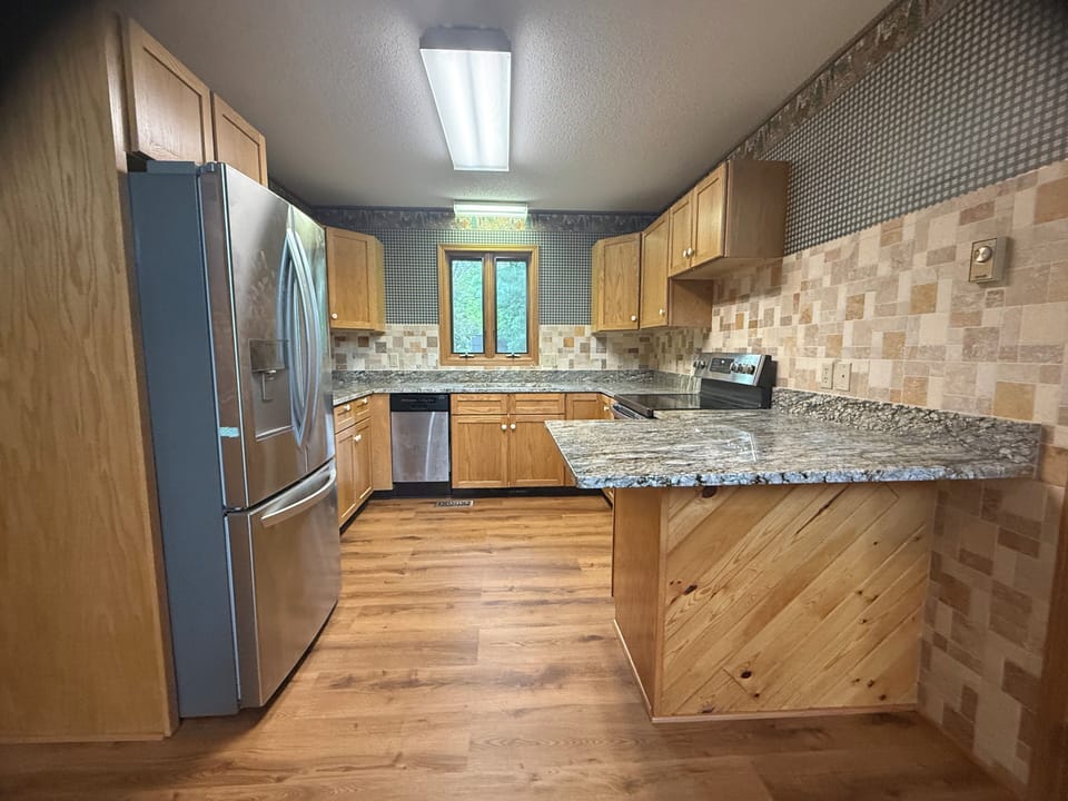A well stocked kitchen with every amenity.