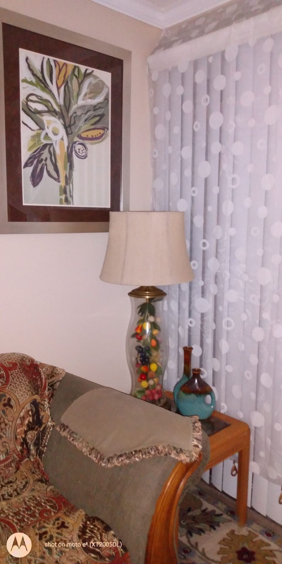 Living room table next to sofa .