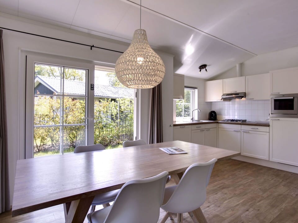 Property, Table, Cabinetry, Wood, Lighting, Chair, Window, Countertop, Interior Design