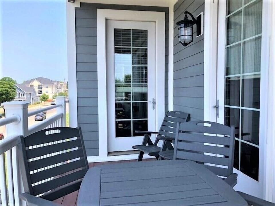 South Balcony - View of south balcony with outdoor dining table and plenty of seating