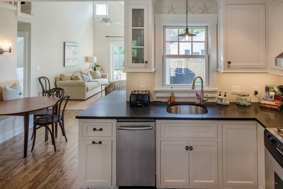 Kitchen Opens To Dining & Living Areas