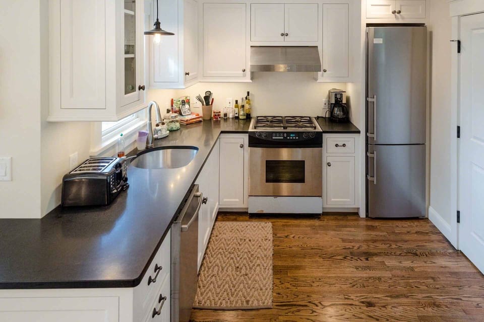 Gourmet Kitchen Features Stainless Appliances & Granite Counters