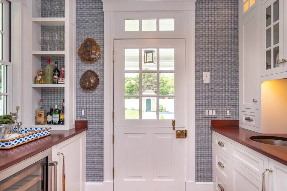 Wet Bar Has a Dutch Door Leading Out to the Covered Porch, Backyard and Pool