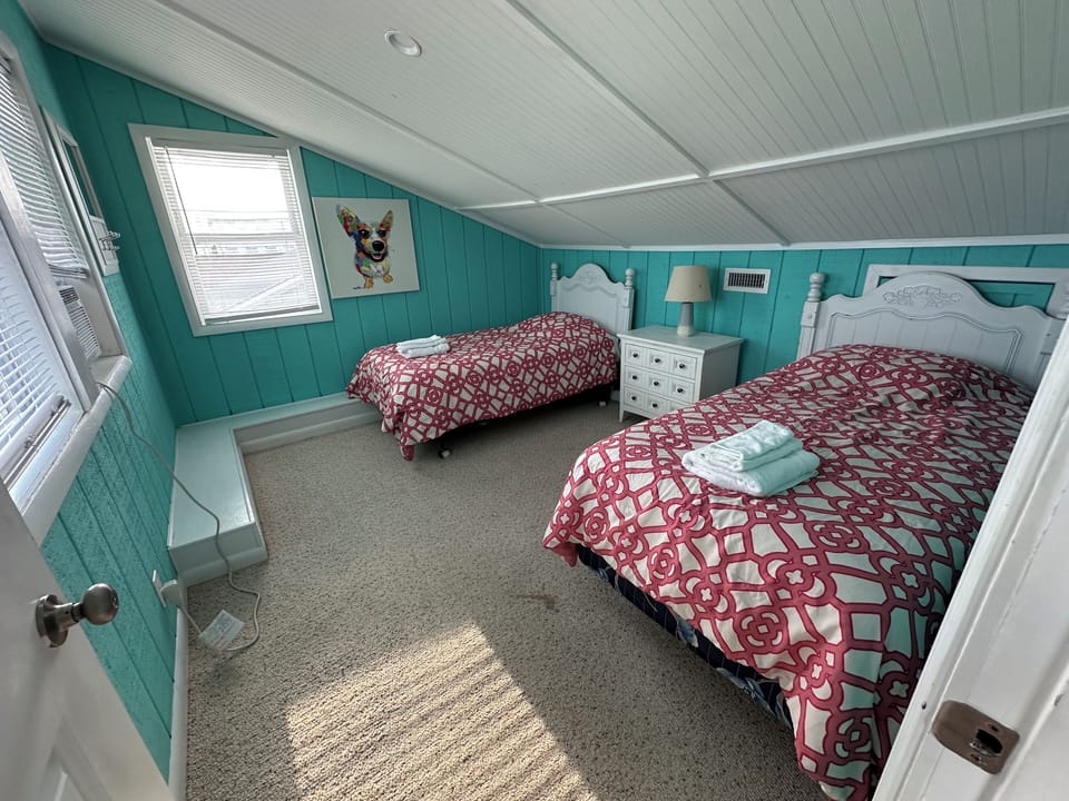 Bedroom 5: Upstairs with two twin beds (these can push together to make a king.