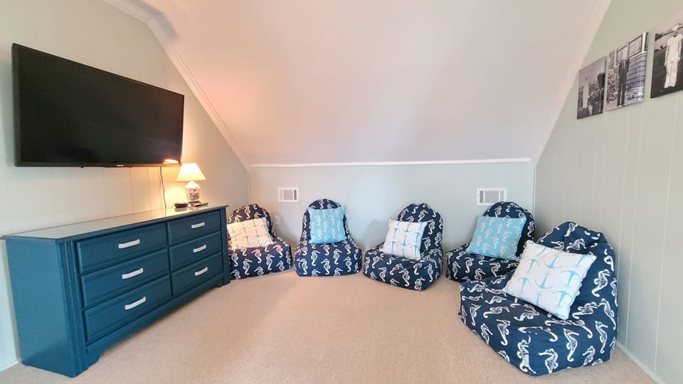 Loft (top of stairs), bean bag chairs, games, puzzles, 50" Fire Smart TV