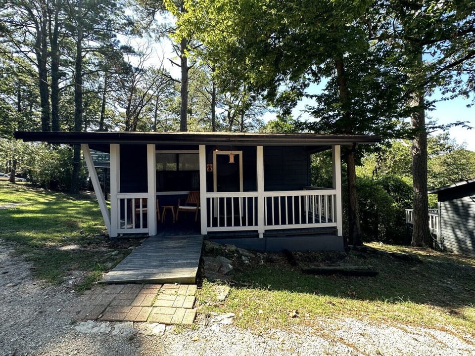 Cabin with outdoor seating in natural beauty