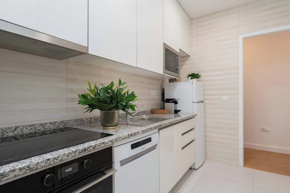 The kitchen is fully equipped to cook the delicious dishes in a comfy space. 