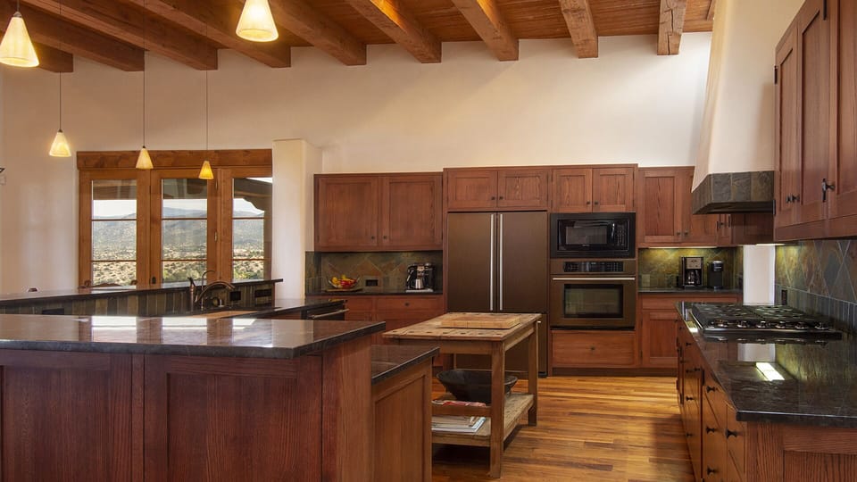 Gourmet kitchen with Viking cooktop and separate beverage cooler