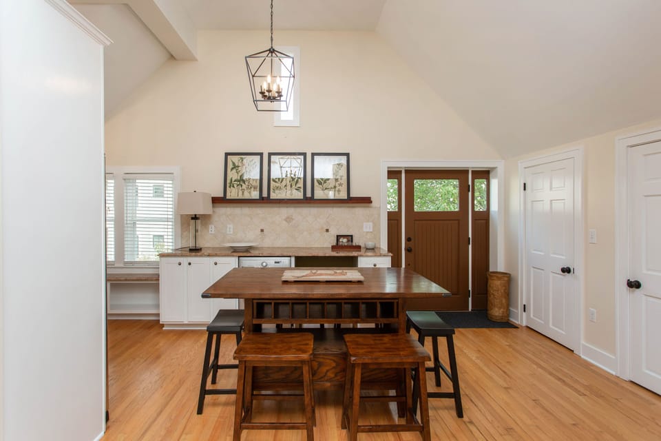 Wood Dining room table. Hardwood floors throughout.  