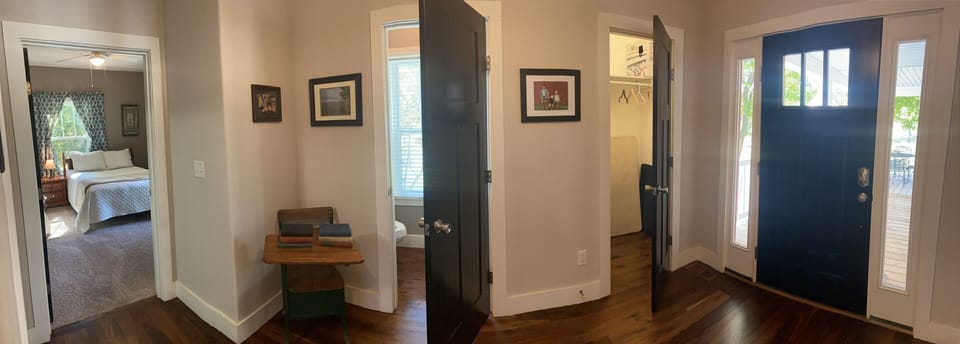 Foyer view. Front door on far right, foyer closet, guest bath, guest room...