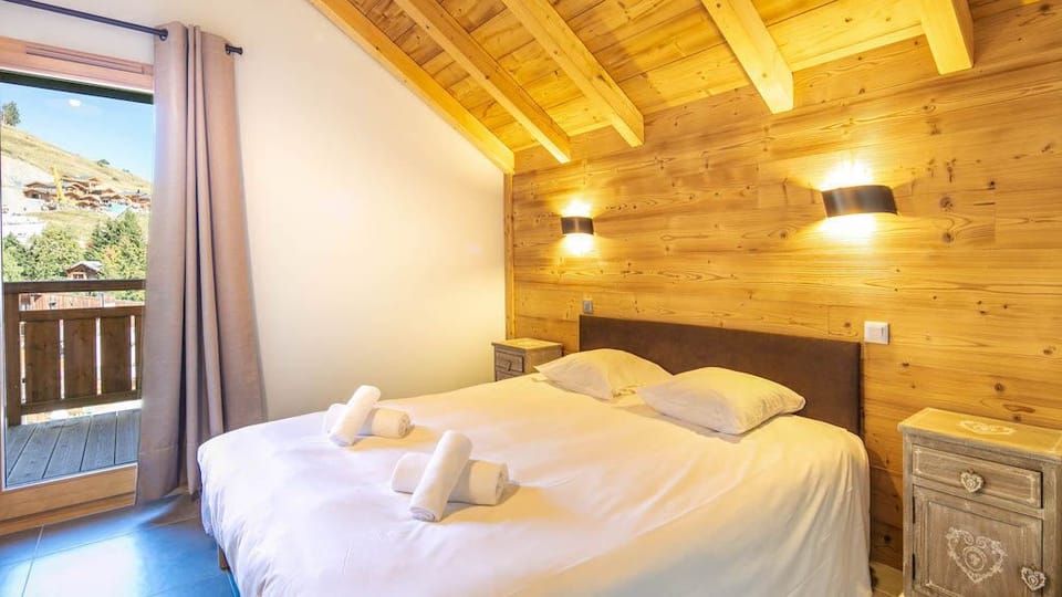 Drift to sleep in this plush bed.
