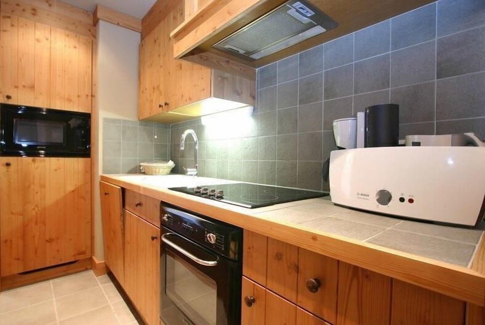 Prepare a meal in the equipped kitchenette.