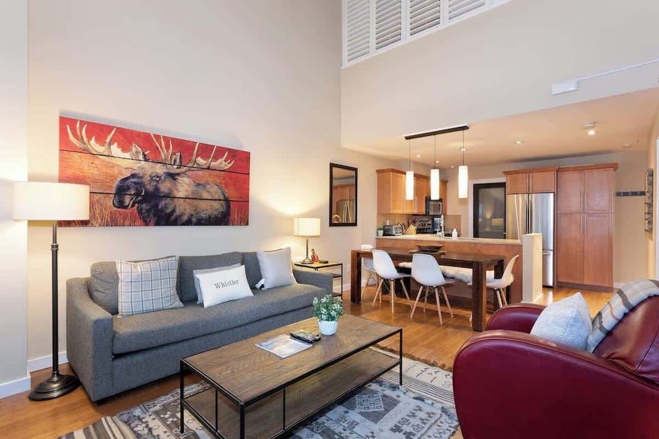 - Spacious layout with open living and dining area  
- Vibrant artwork and high ceilings enhance the feel  
- Perfect for friends or families exploring Whistler  
