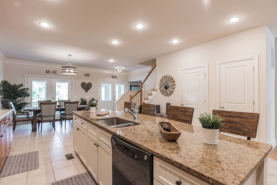 Open kitchen dining layout so families can cook and dine together.