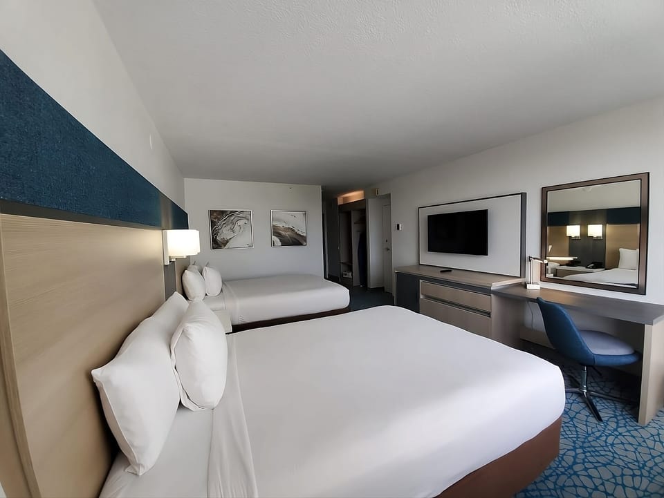 Settle in with a roomy desk and easy in-room entertainment.