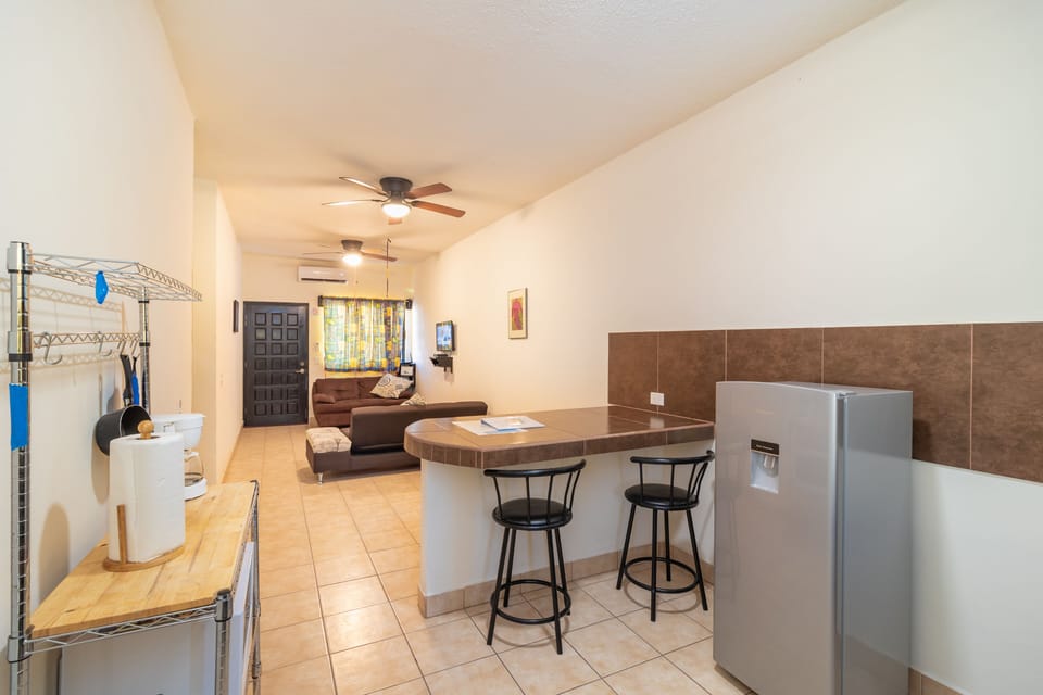 kitchen and living room are connected in one "great" room.
