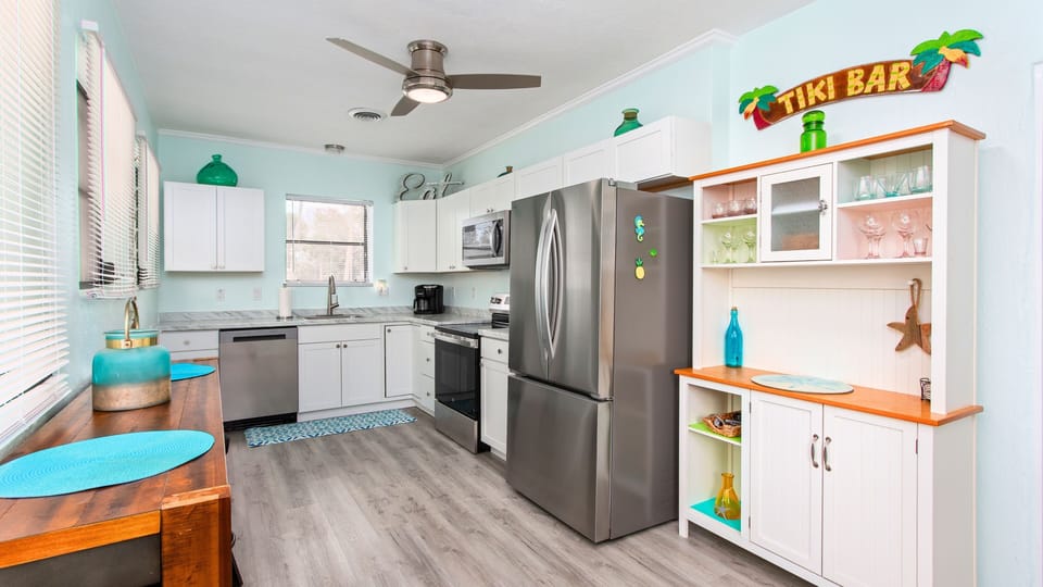 Fully Loaded Kitchen – Equipped for real cooking with stainless steel appliances and ample cookware.