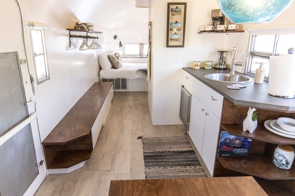 Trailer with mini fridge, sink, coffeemaker, tea kettle and tea