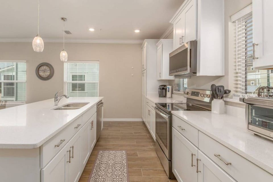 Modern kitchen supplied with what you'll need to cook up family meals