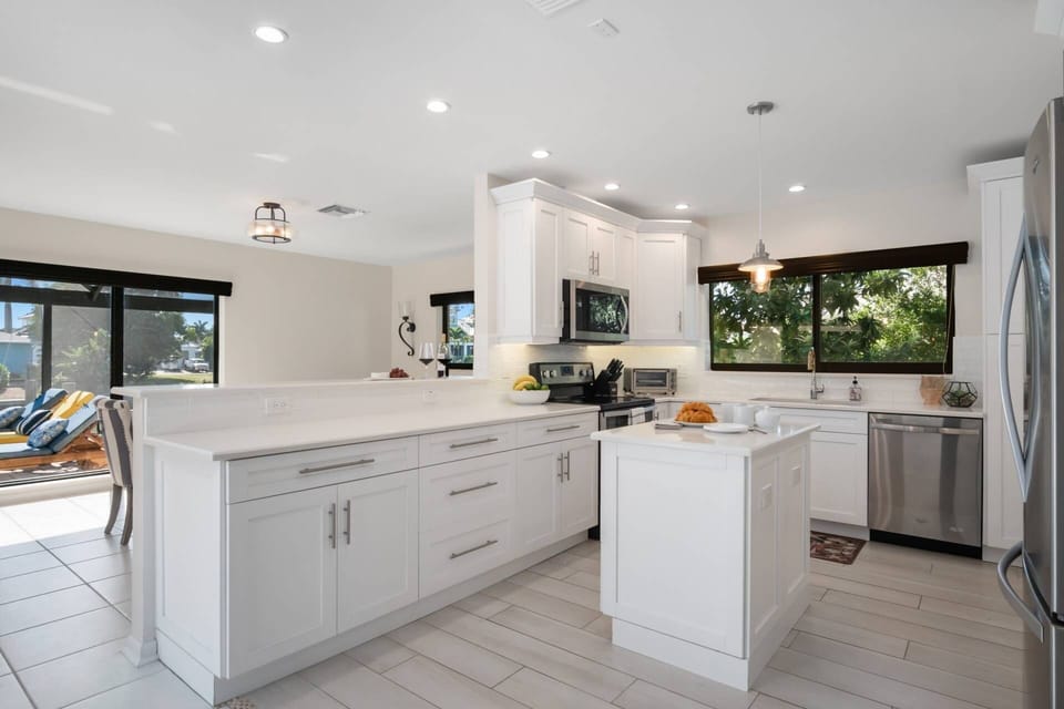 Any chef would enjoy whipping up a snack or full meal in this light-filled kitchen.