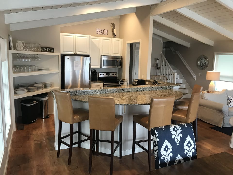Stainless appliances and open shelving 