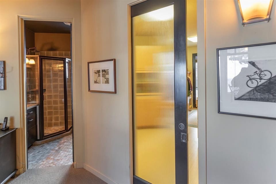 Sliding glass pocket door leads to the main floor laundry.