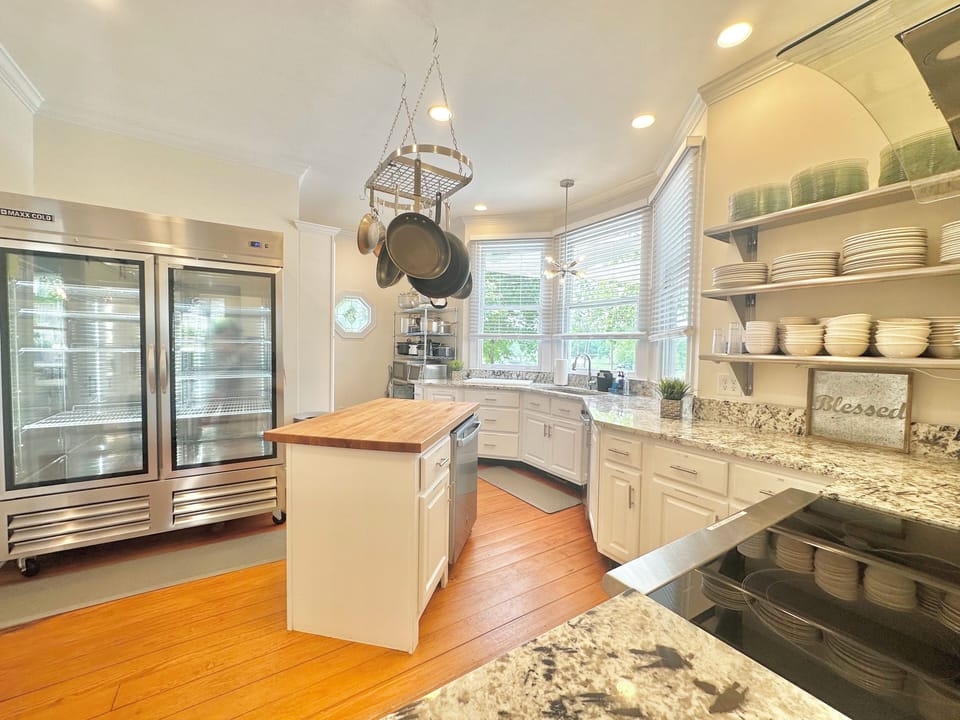 Large kitchen with commercial oven. TONS provided! Ask us for our stocked list!