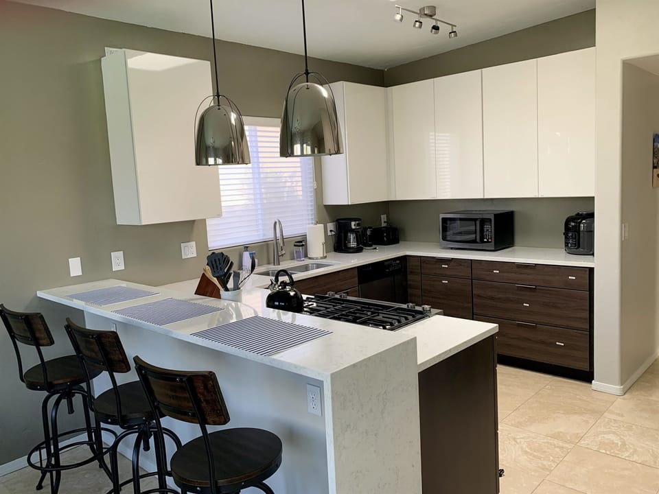 Modern kitchen is well equipped to make meal preparation easy.