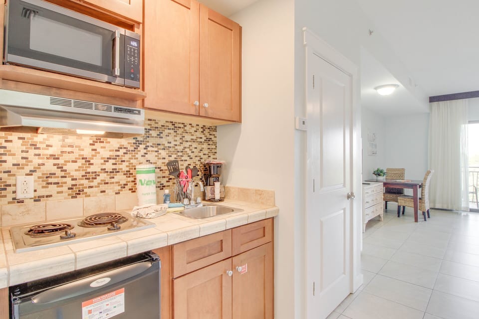 Kitchenette equipped with everything you will need to come some quick meals including a dorm size fridge, microwave, coffee pot, knife set, cooking + eating utensils!