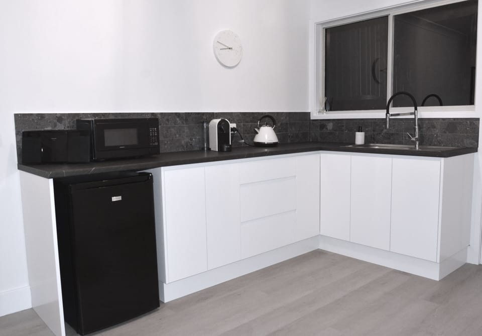 Studio Kitchen (complete with single induction hob, microwave, kettle & toaster)