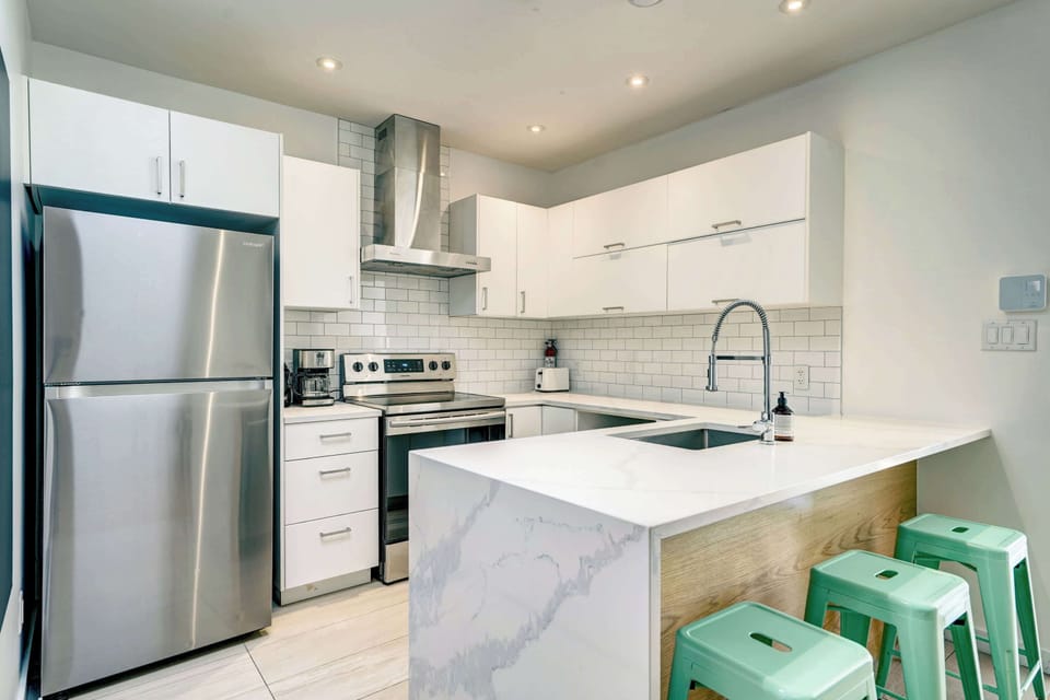 The kitchen is fully  equipped with large and small appliances, cookware, dishes, etc.