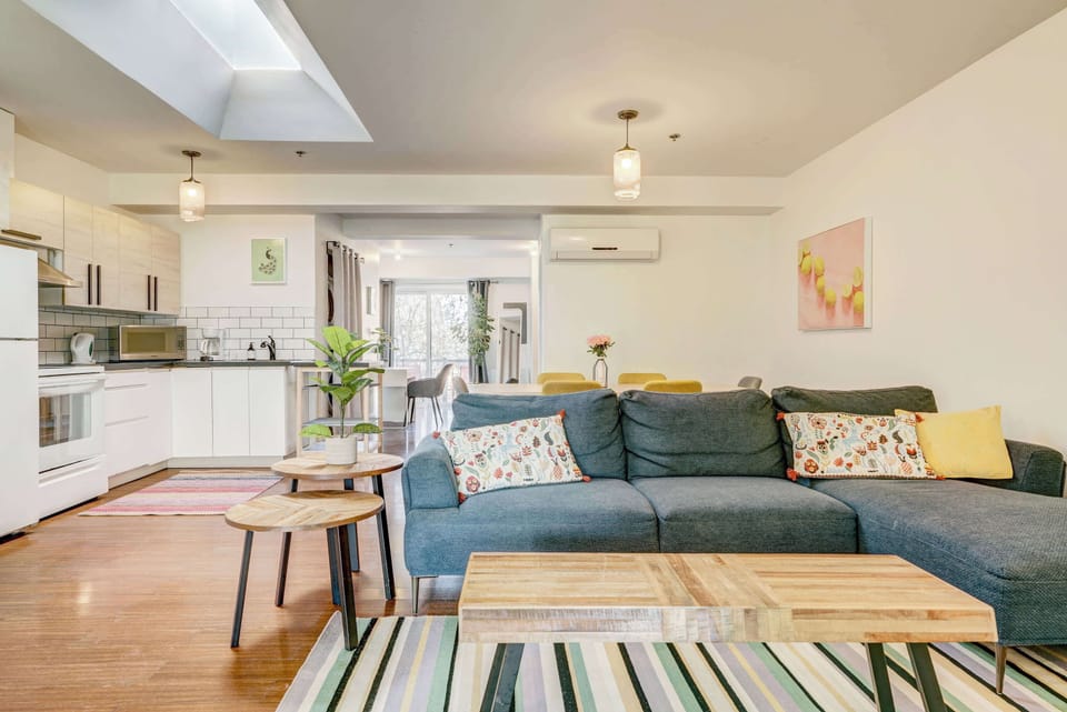 The living room in apartment #2 has a big sofa for 2 people if needed!