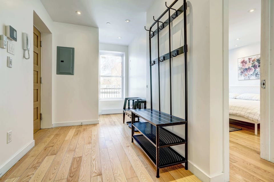 The entryway leads to the living space and kitchen.