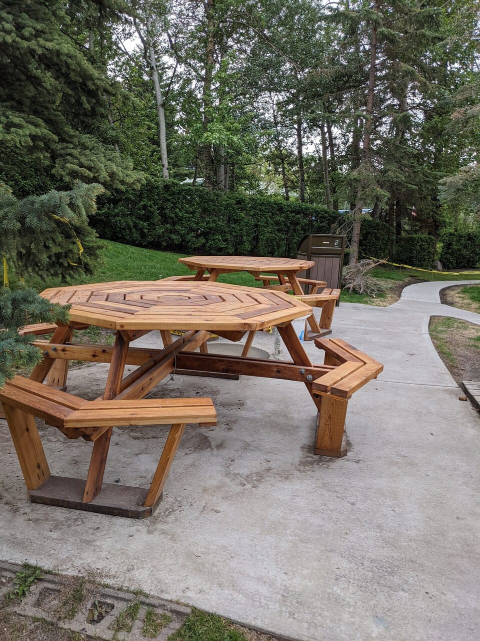 Shared BBQ area with large picnic tables and Firepit 