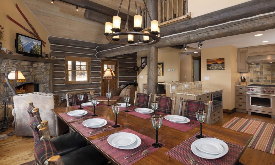 Gather around your rustic dining table where mountain memories are made, with crackling fireplace warmth and gourmet kitchen at your fingertips.