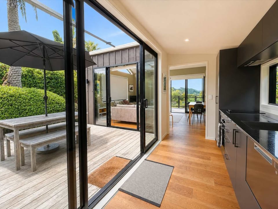 Kitchen leads on to the courtyard via glass sliding doors