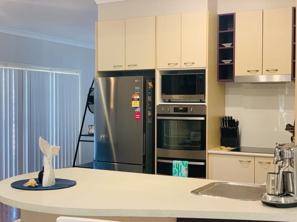 Full sized Fridge, Electric Oven & Hot Plates plus Coffee Machine