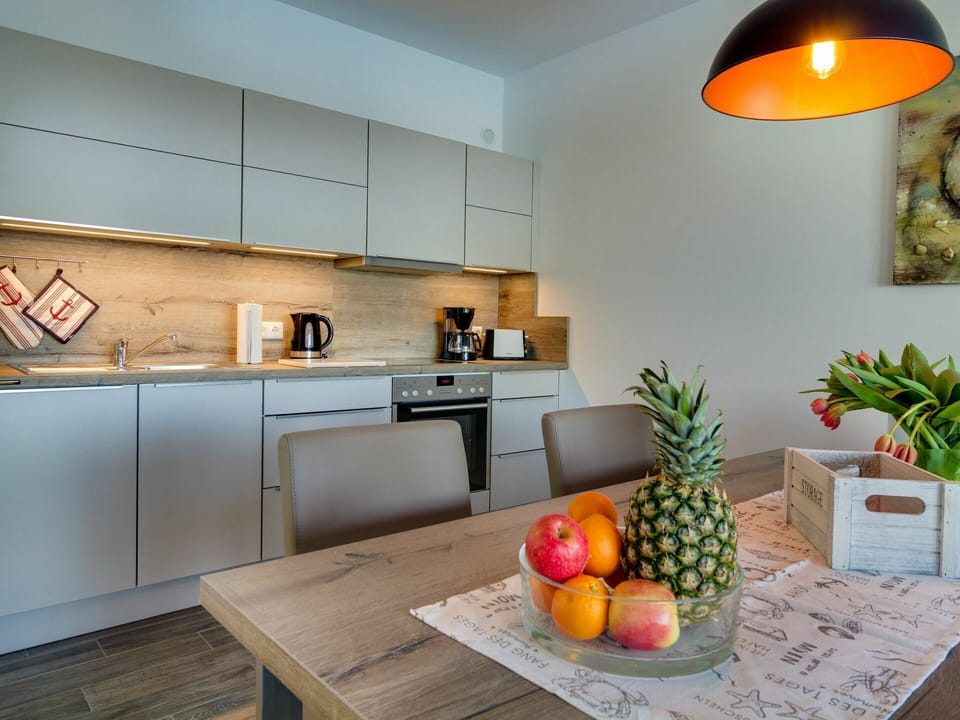 Countertop, Room, Property, Interior Design, Furniture, Orange, Kitchen, Floor, House, Yellow