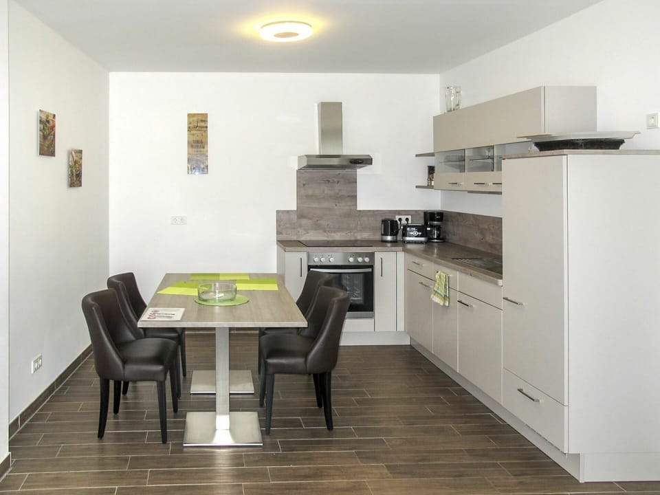 Room, Furniture, Property, Floor, Interior Design, Kitchen, Building, Yellow, House, Ceiling