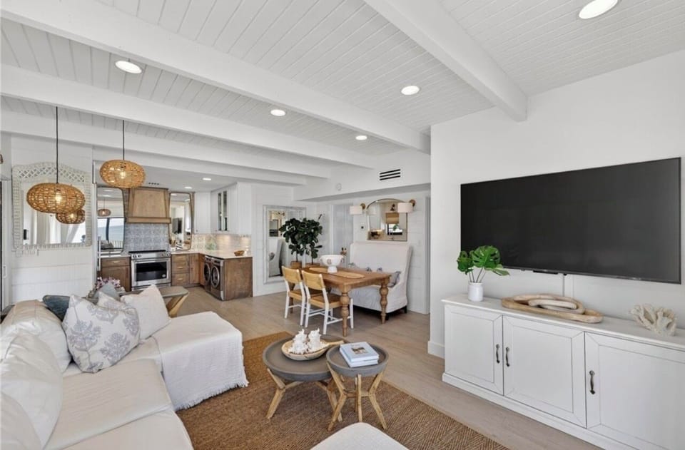 Bright coastal interior with panoramic ocean views and relaxed elegance.