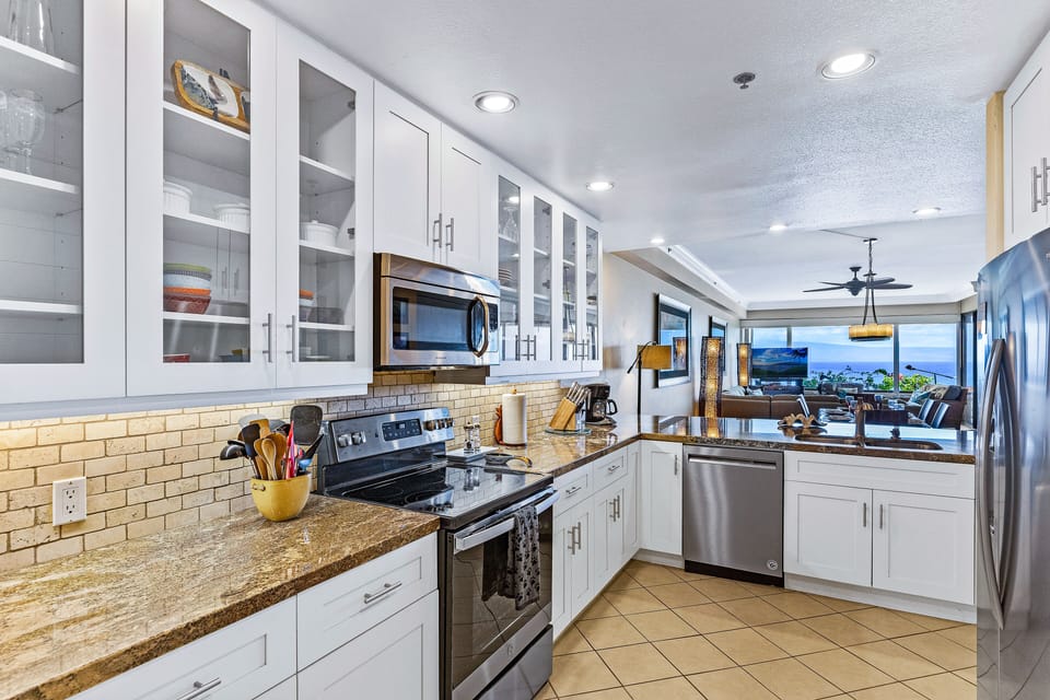 The kitchen is large with views too.  New dishwasher, fridge, and range.
