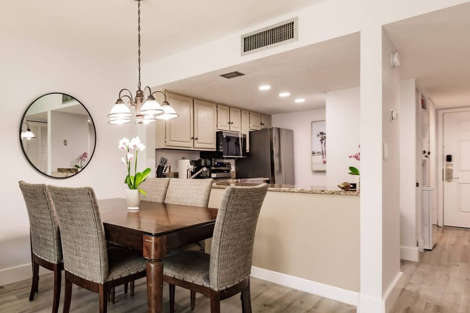 The dinning room table seats six and offers views of the kitchen area.