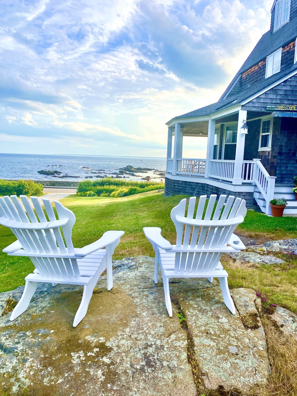 2 of the 4 Adirondack chairs facing ocean