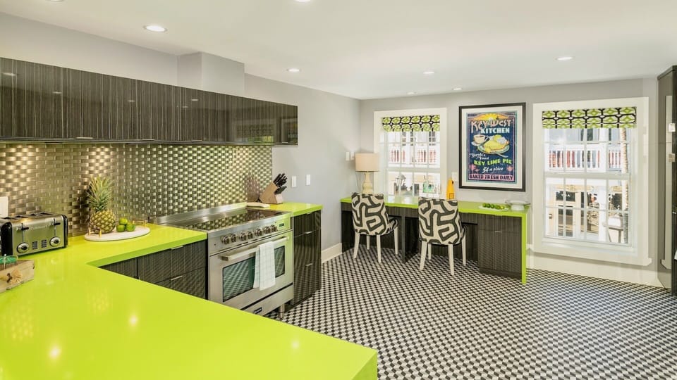 Keep the cook(s) company at the kitchen bar or built-in desk on the opposite end of the kitchen...