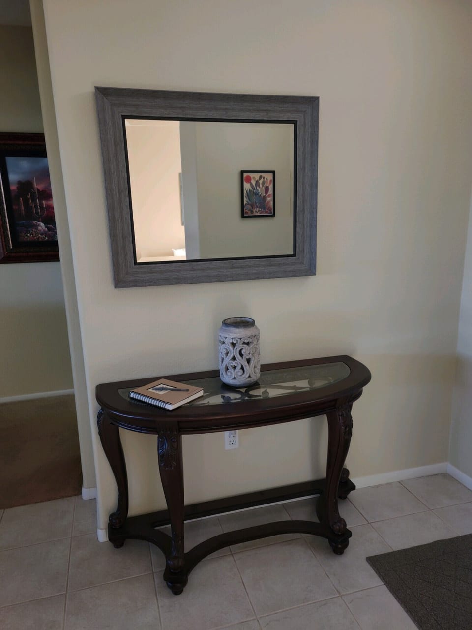 Entry with deadbolt and locking screen.