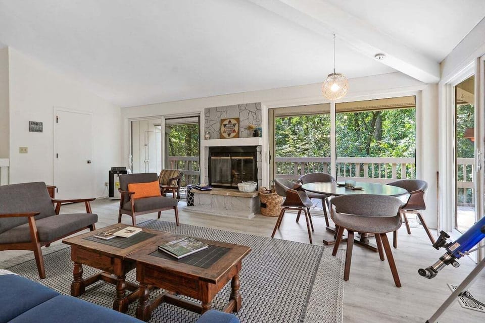 Commons living area with seating and table with beautiful views