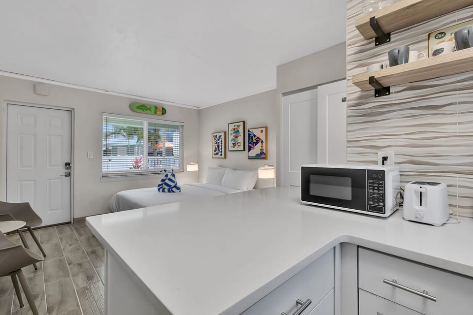 The kitchen is equipped with basics for convenience, allowing you to whip up breakfast or beach snacks without leaving the resort.