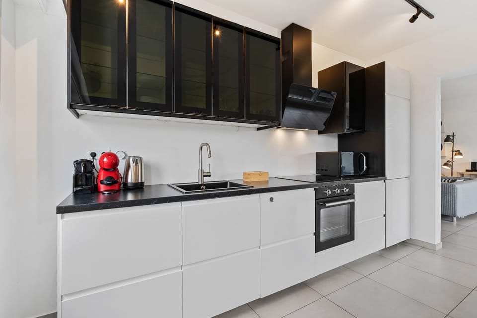 Spacious kitchen with state-of-the-art appliances—perfect for cooking and socializing.